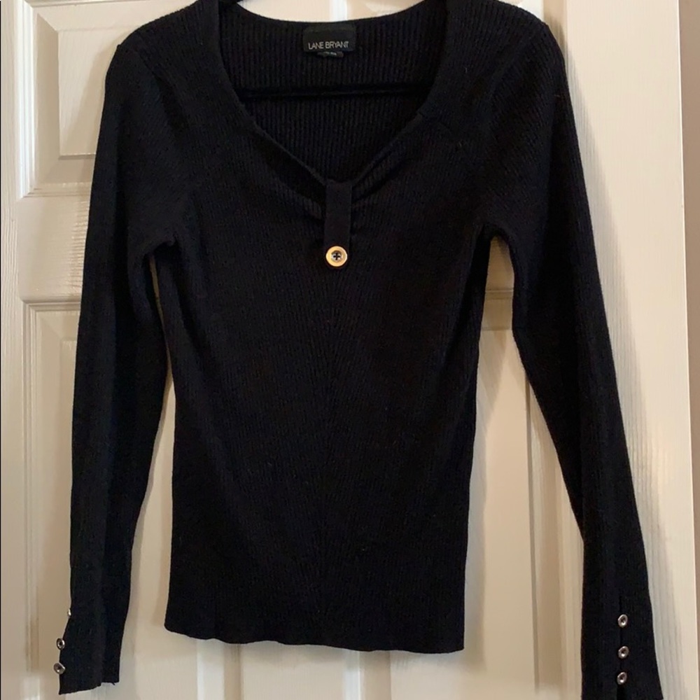 Black sweater with metal button accents